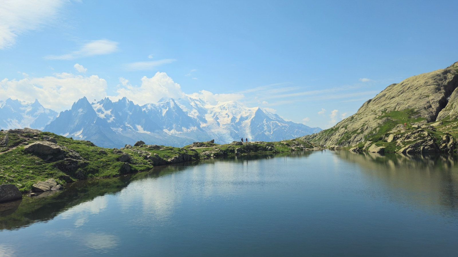 An alpine lake reflecting the Mont Blanc massif near Chamonix, France